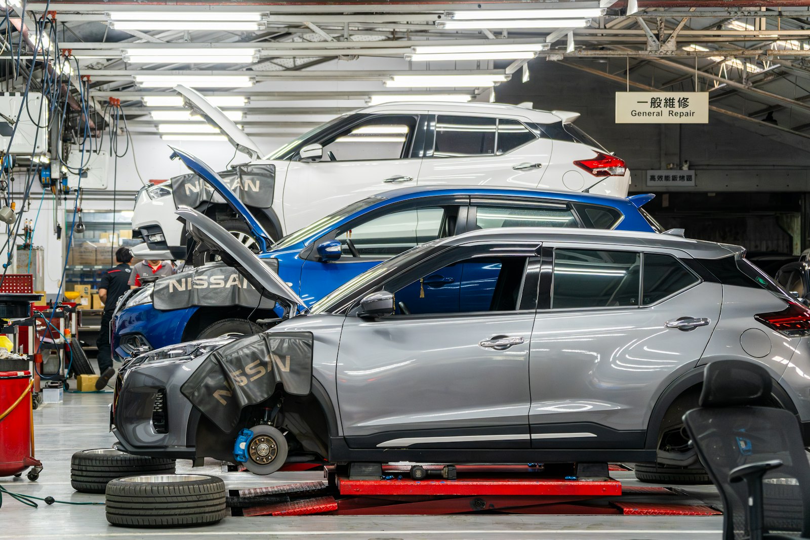 Vehicle up on the lift in the service bay